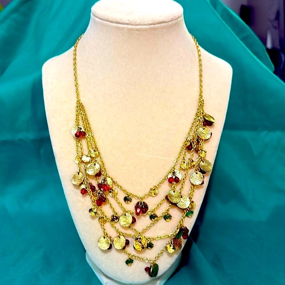 Daisy Fuentes Multi gold strand with purple crystals and gold circles